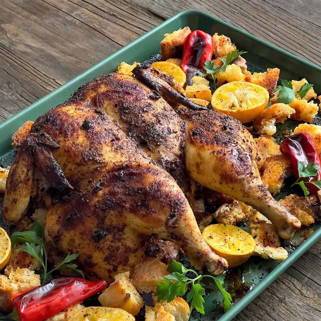 Spatchcocked Chicken with Chile Rub, Meyer Lemons, and Croutons