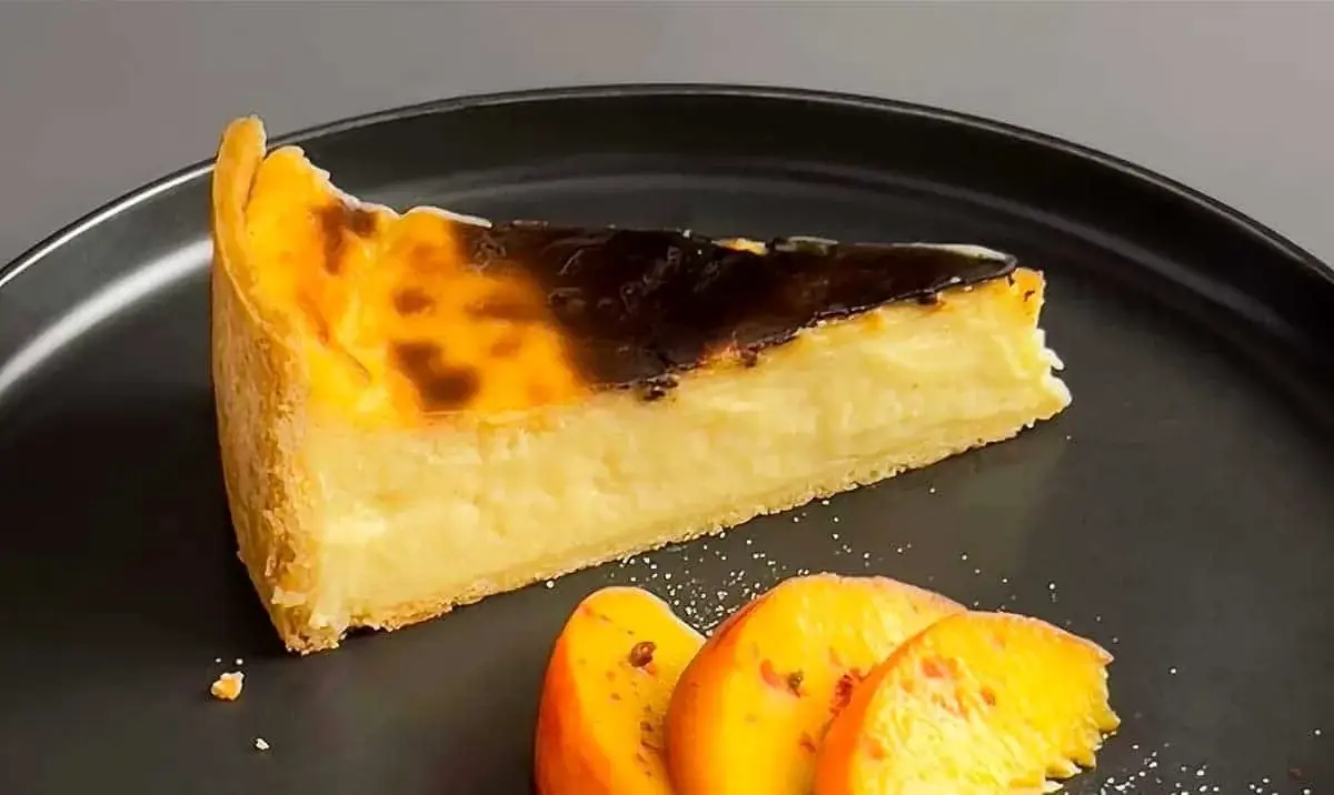 Slice of Peaches and Cream Flan Parisien