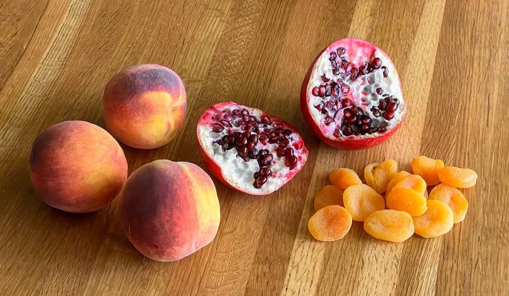 Fresh Peaches, Pomegranate Seeds and Dried Apricots