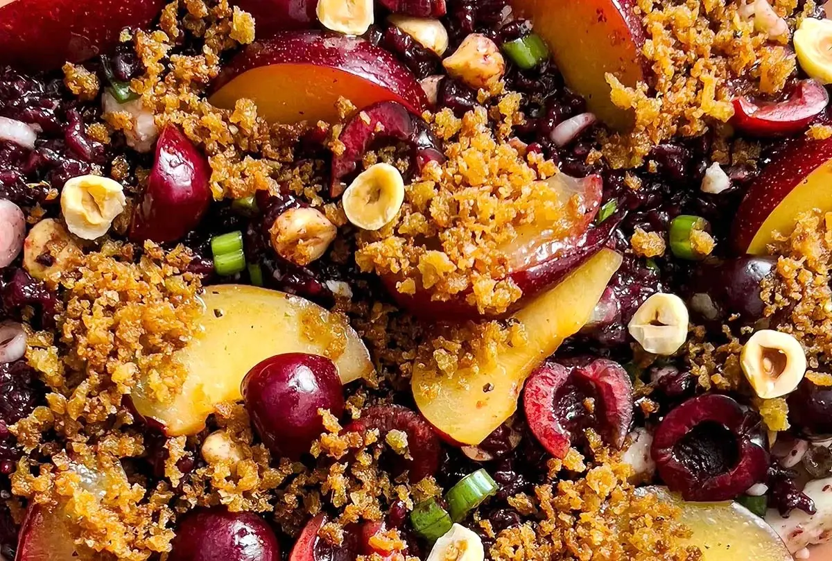 Closeup of Black Rice, Plum, and Cherry Salad