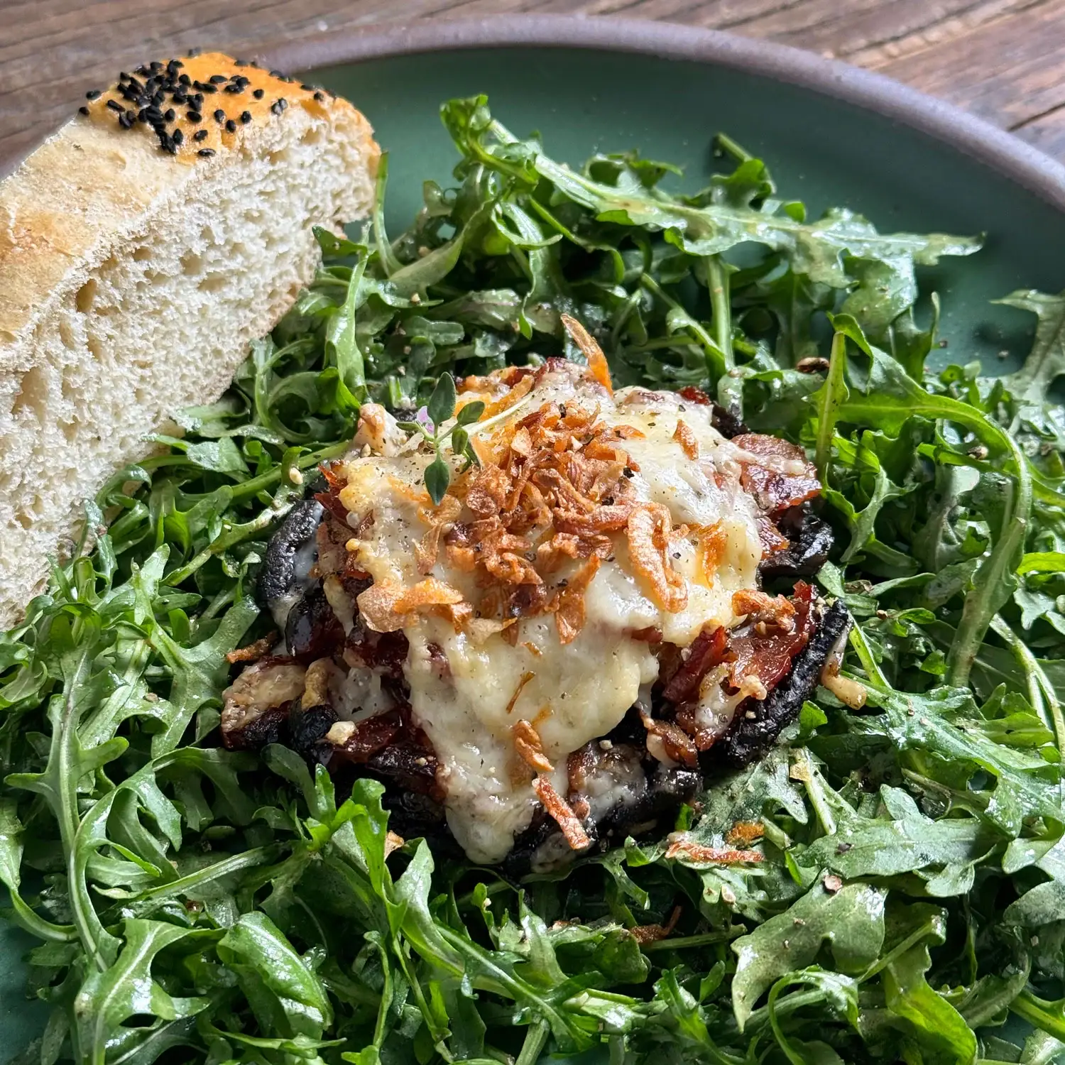 Bacon-Stuffed Portobello Mushrooms on Bitter Greens