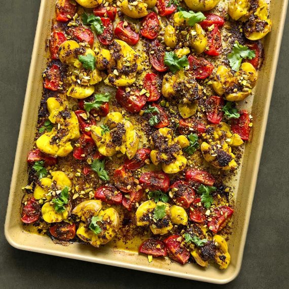 Crushed Potatoes with Roasted Tomatoes and Pistachios
