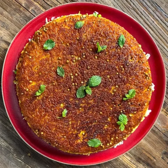 Tahdig with Barberries, Peas, and Mint